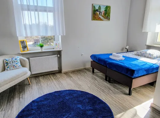 Rodzinne pokoje w  Pałacu pod Bocianim Gniazdem w Runowie